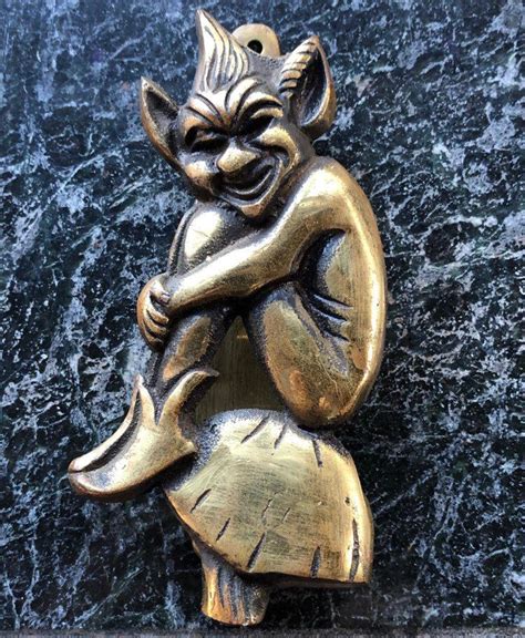 Unlock the mystical with these witch inspired door knockers